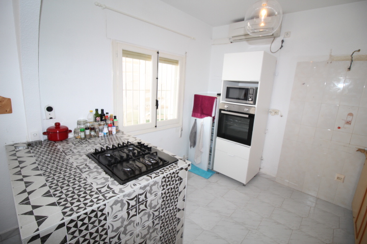 Bungalow con tres habitaciones y dos baños a reformar en Las Filipinas - Villamartin