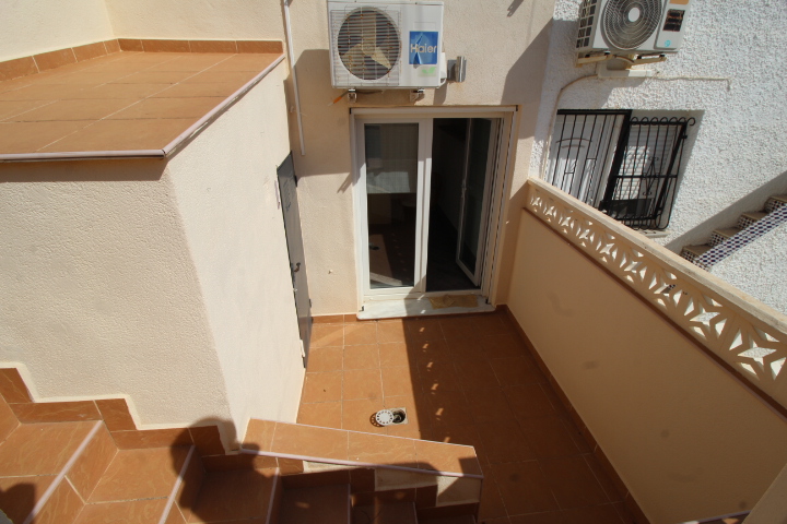 Bungalow adosado con solárium, vistas al mar y orientación este en Blue Lagoon – Villamartín