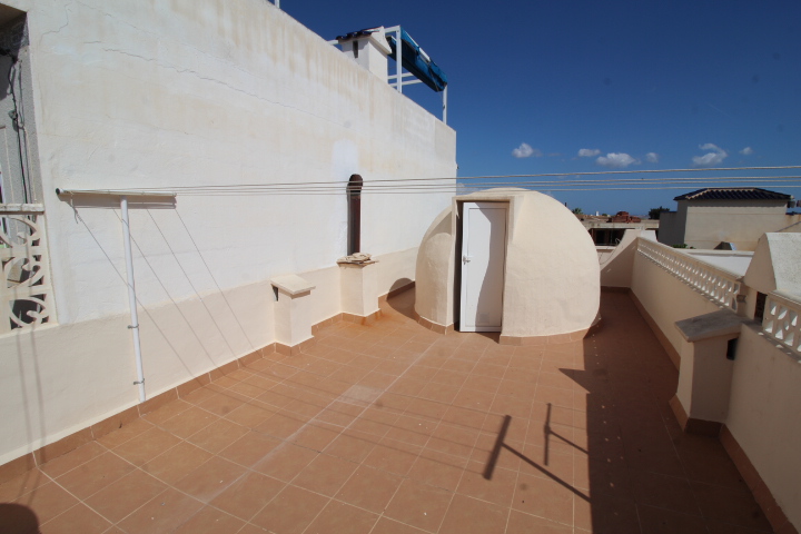 Bungalow adosado con solárium, vistas al mar y orientación este en Blue Lagoon – Villamartín