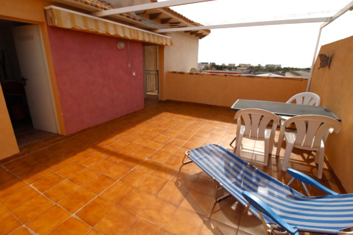 Top floor apartment in Punta Prima