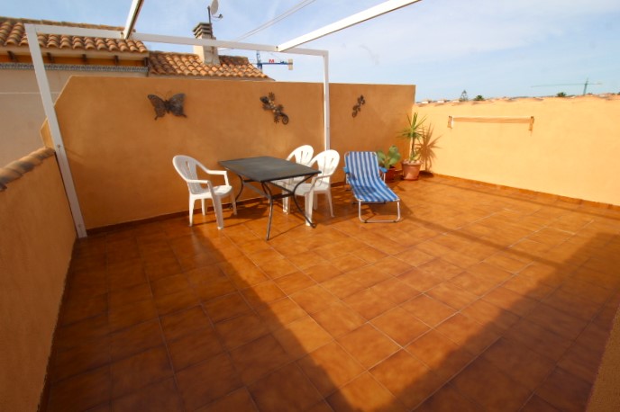 Top floor apartment in Punta Prima