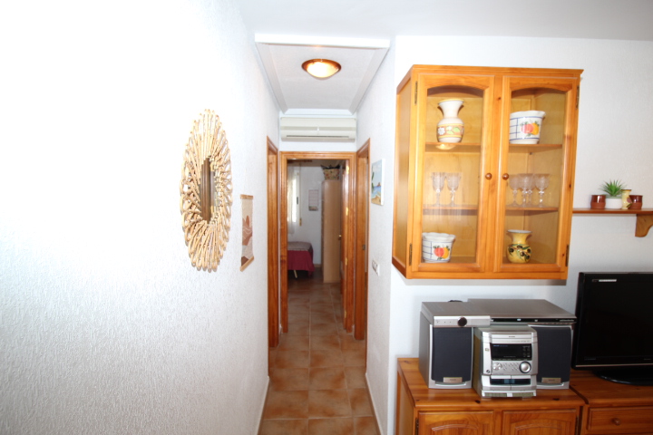 Encantador bungalow adosado de 2 habitaciones y 1 baño, con piscina comunitaria en Montegolf - Villamartin