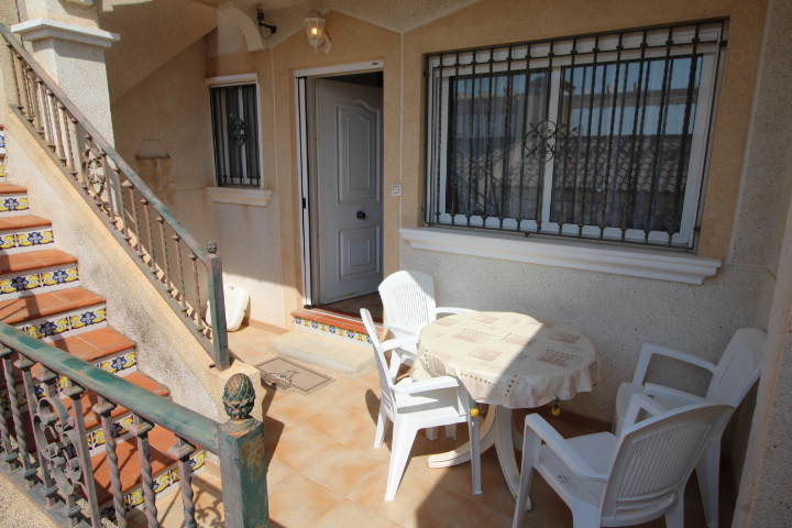 Encantador bungalow adosado de 2 habitaciones y 1 baño, con piscina comunitaria en Montegolf - Villamartin
