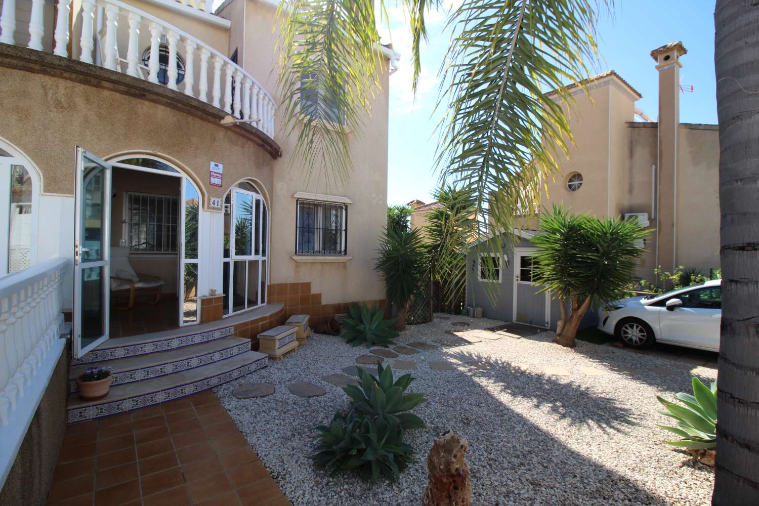 Quad-style bungalow with garden, terraces, swimming pool and sea views in Villamartín