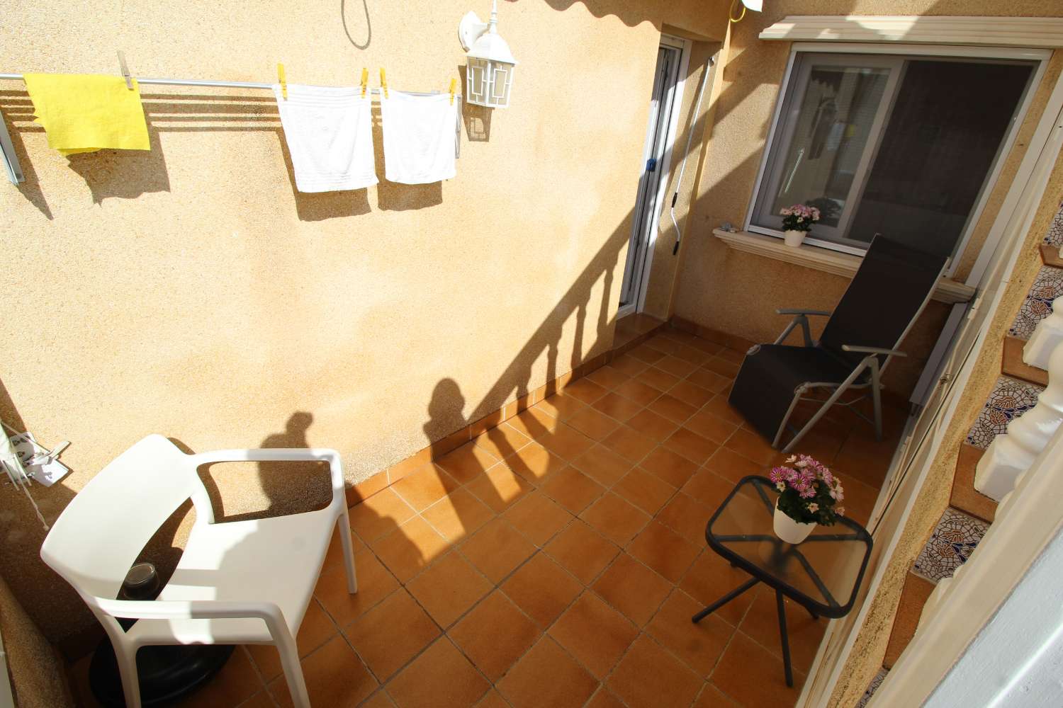 Quad-style bungalow with garden, terraces, swimming pool and sea views in Villamartín