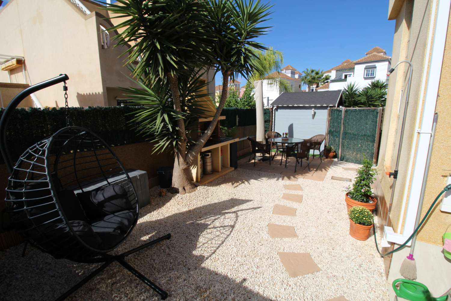 Quad-style bungalow with garden, terraces, swimming pool and sea views in Villamartín
