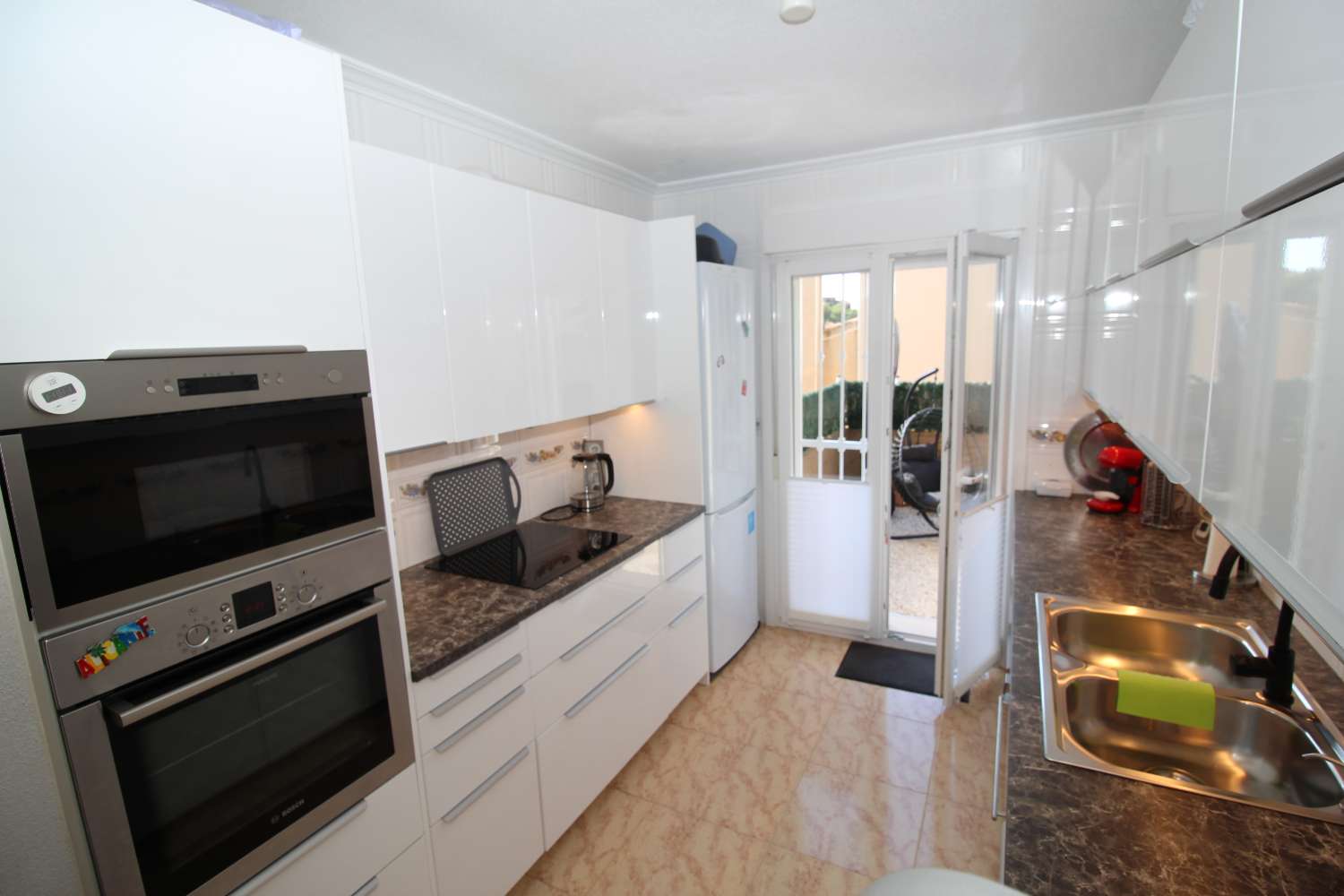 Quad-style bungalow with garden, terraces, swimming pool and sea views in Villamartín