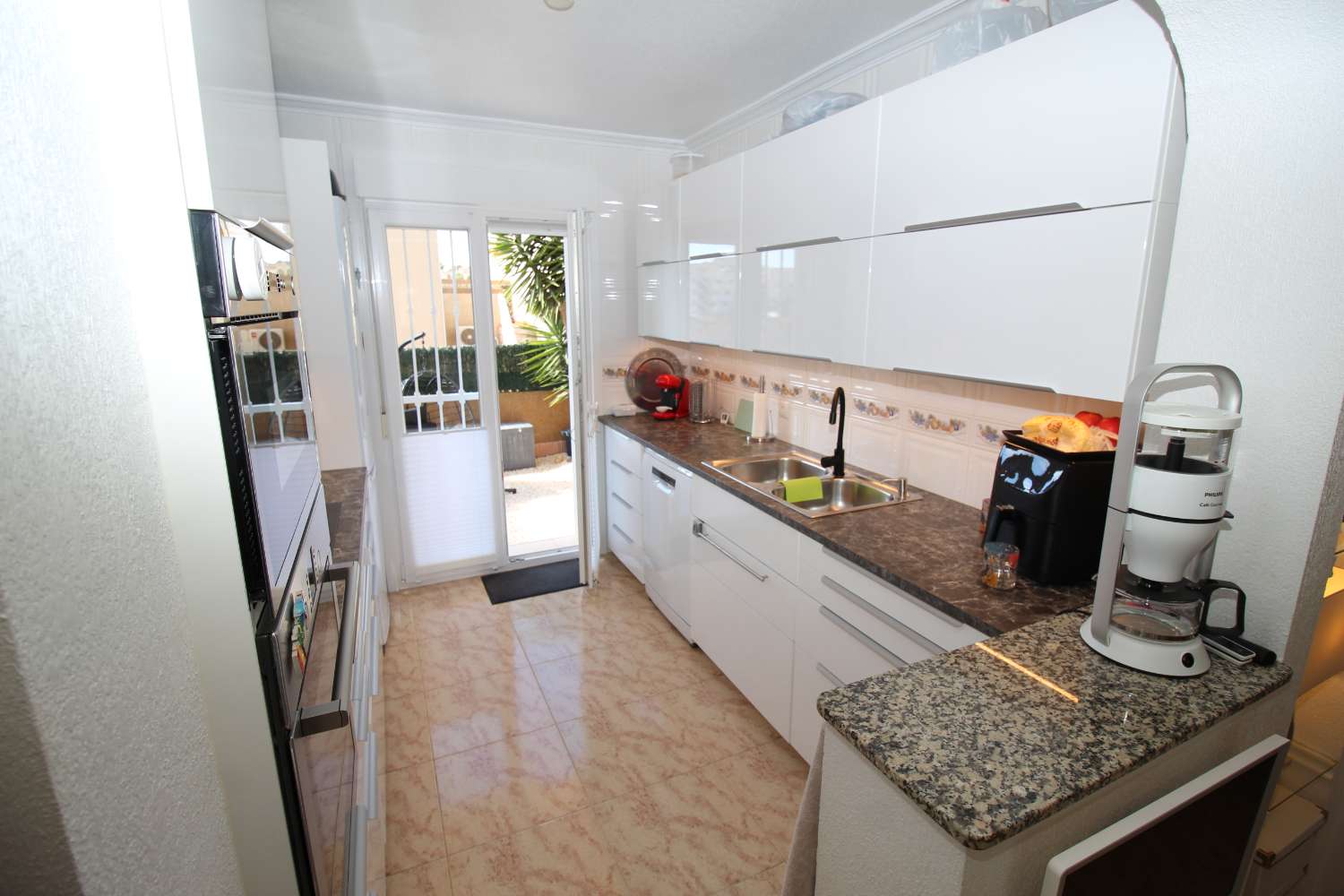 Quad-style bungalow with garden, terraces, swimming pool and sea views in Villamartín