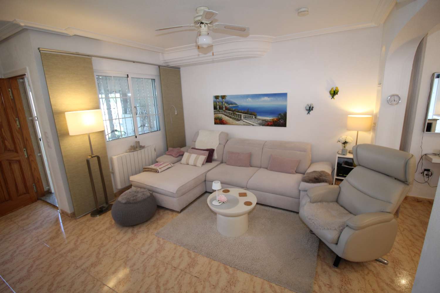Quad-style bungalow with garden, terraces, swimming pool and sea views in Villamartín