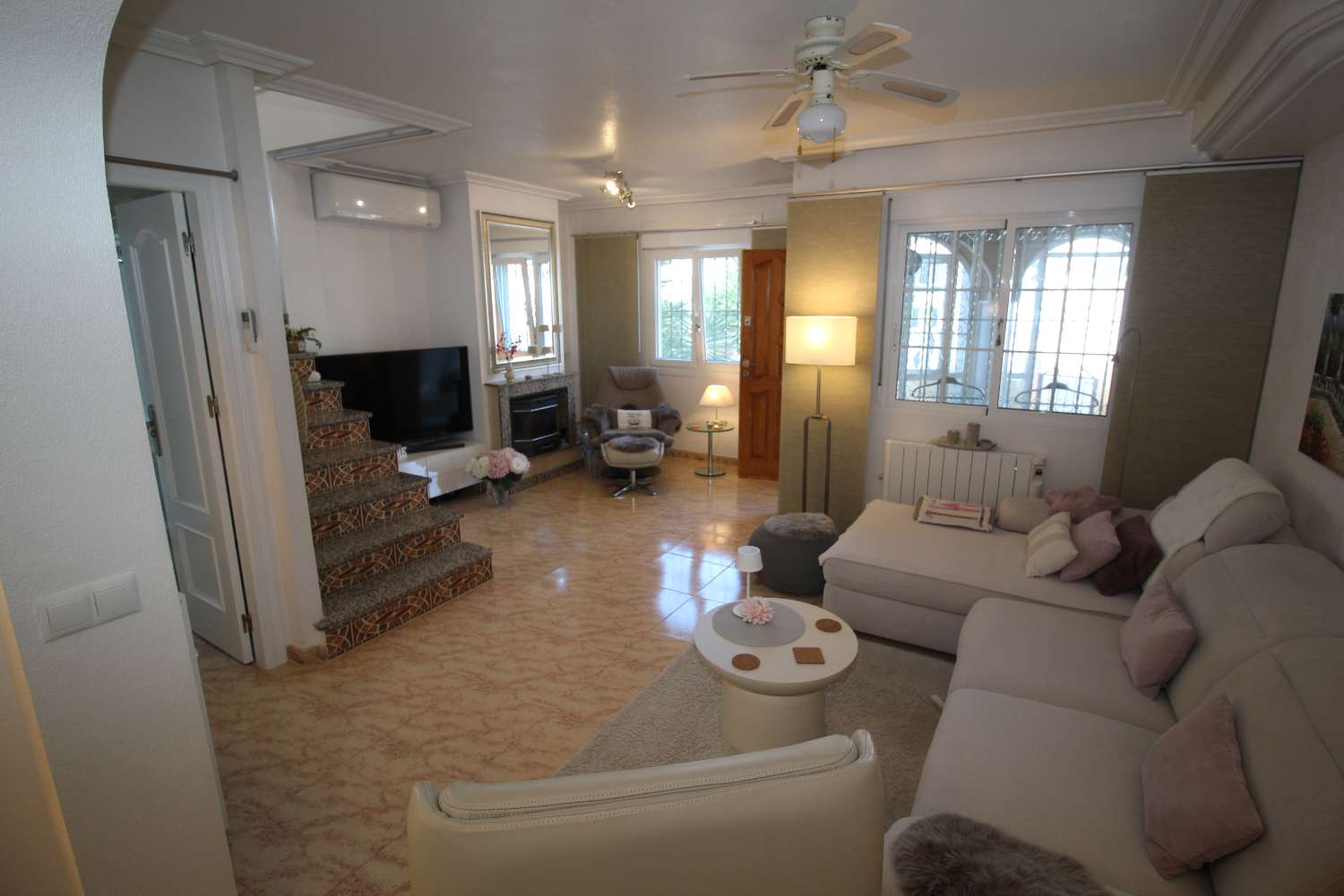 Quad-style bungalow with garden, terraces, swimming pool and sea views in Villamartín