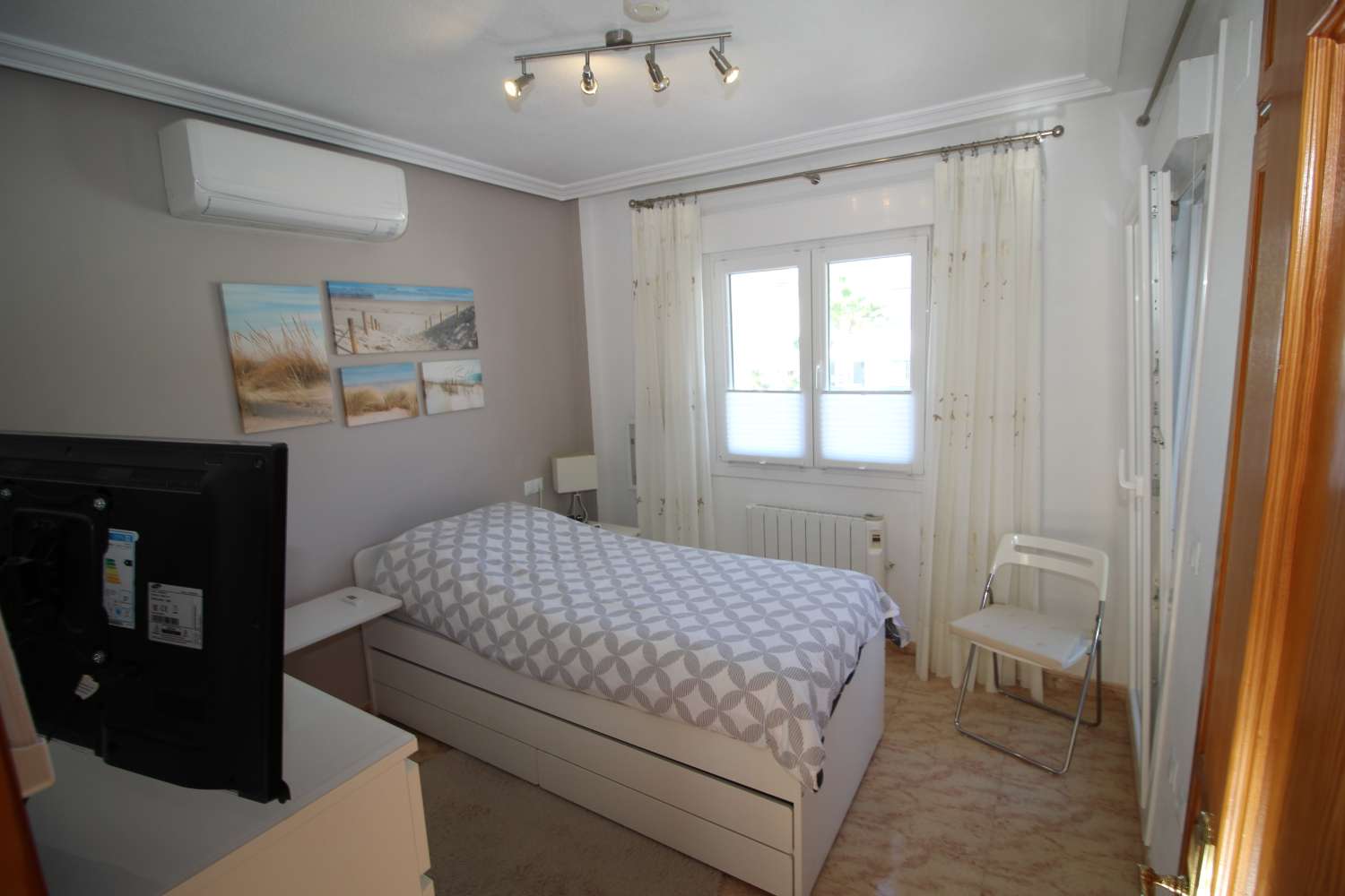 Quad-style bungalow with garden, terraces, swimming pool and sea views in Villamartín