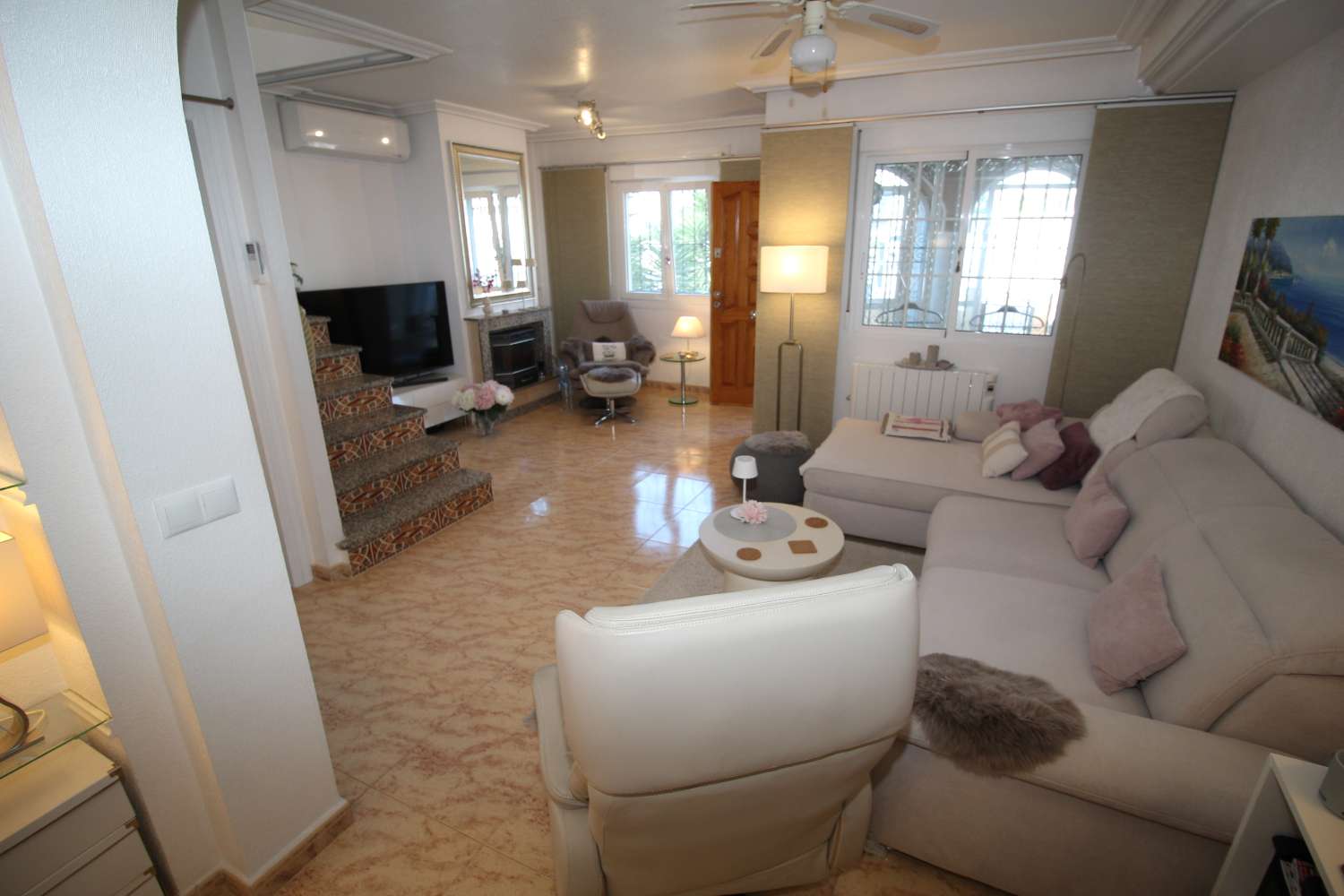 Quad-style bungalow with garden, terraces, swimming pool and sea views in Villamartín