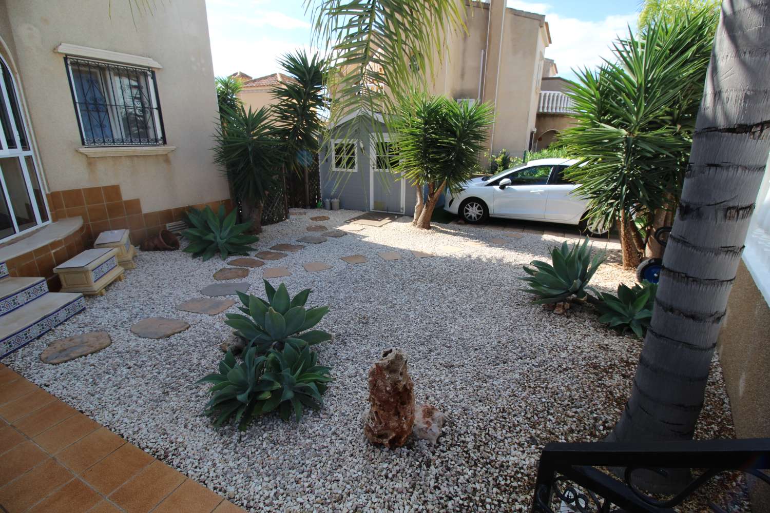 Quad-style bungalow with garden, terraces, swimming pool and sea views in Villamartín