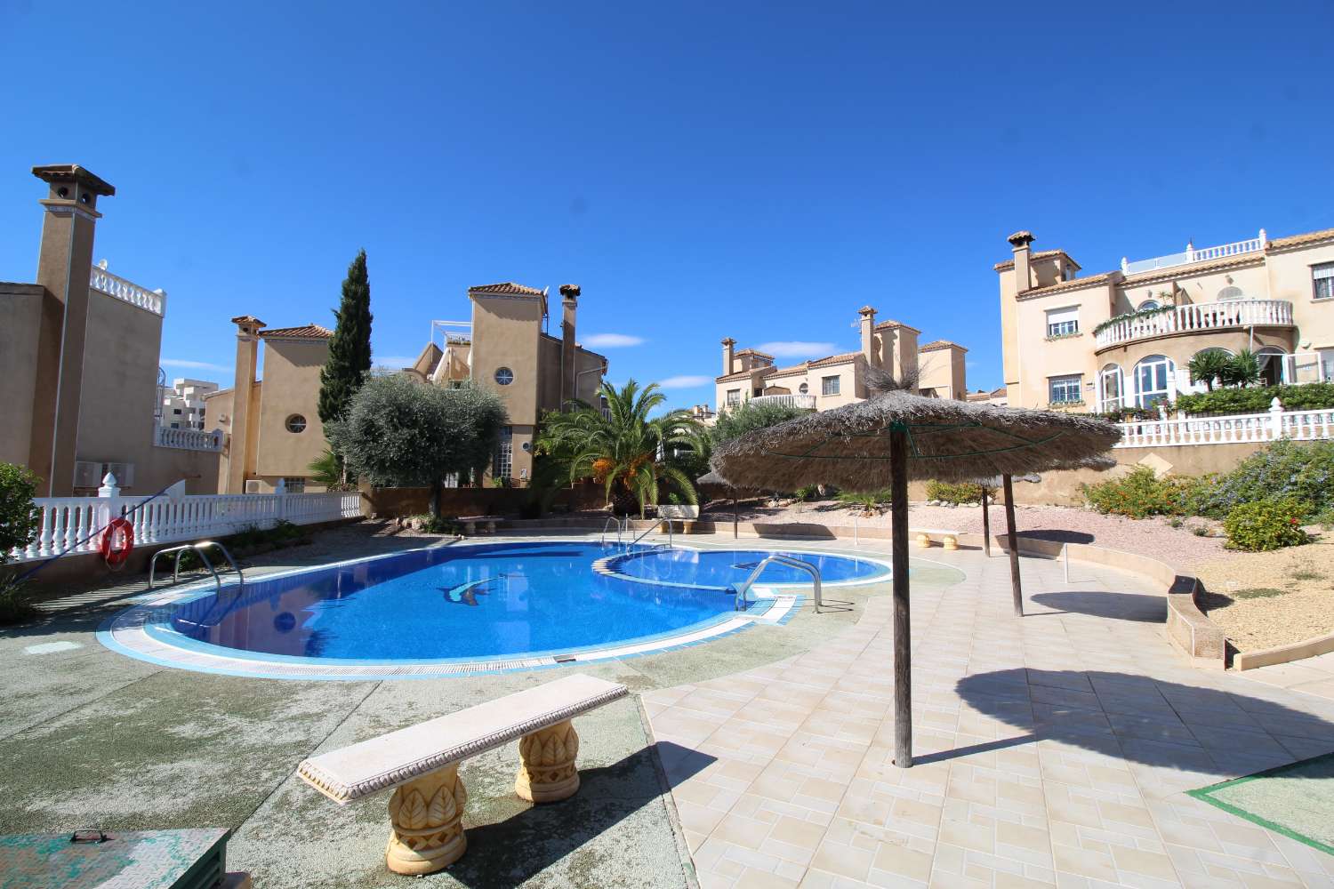 Quad-style bungalow with garden, terraces, swimming pool and sea views in Villamartín