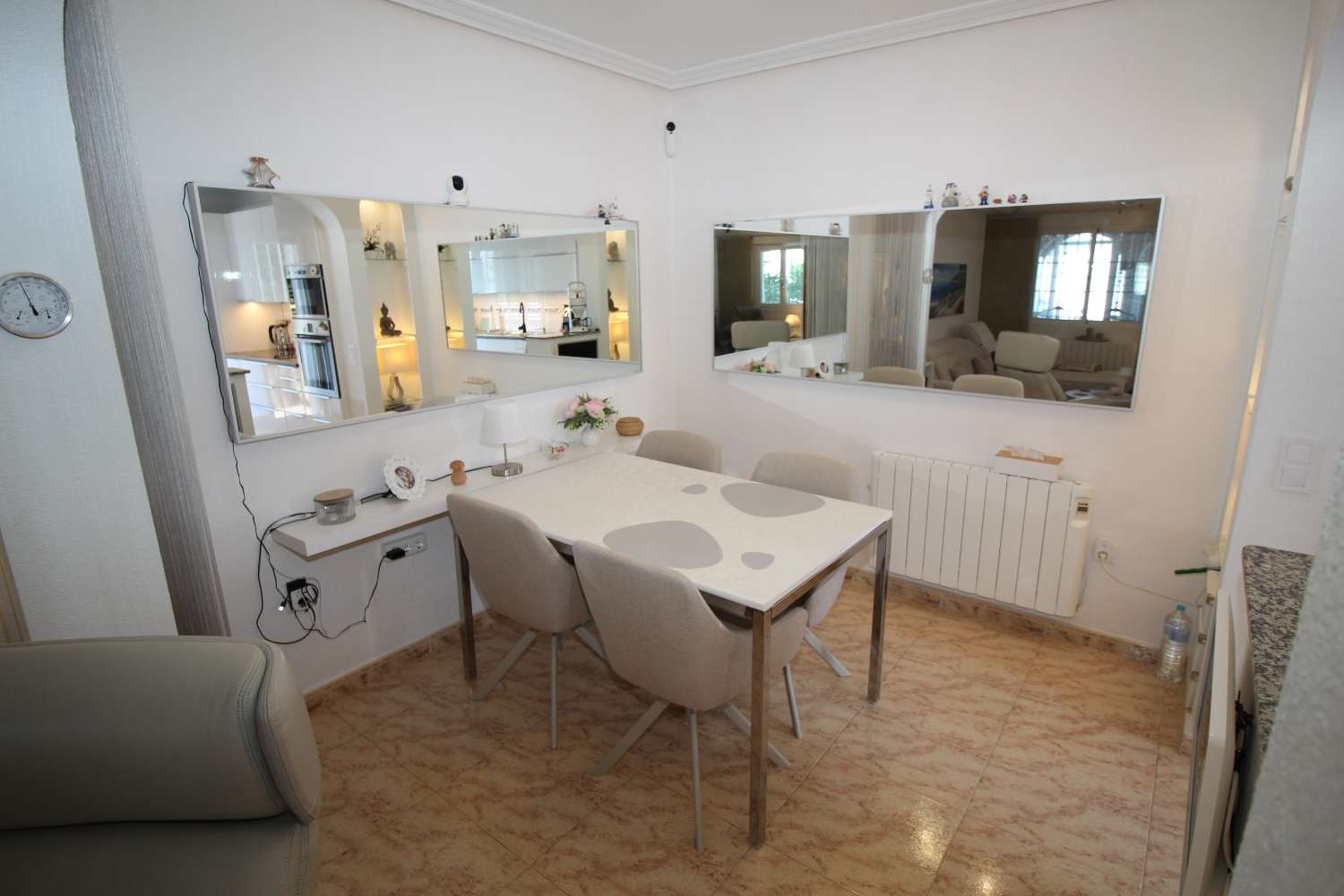 Quad-style bungalow with garden, terraces, swimming pool and sea views in Villamartín