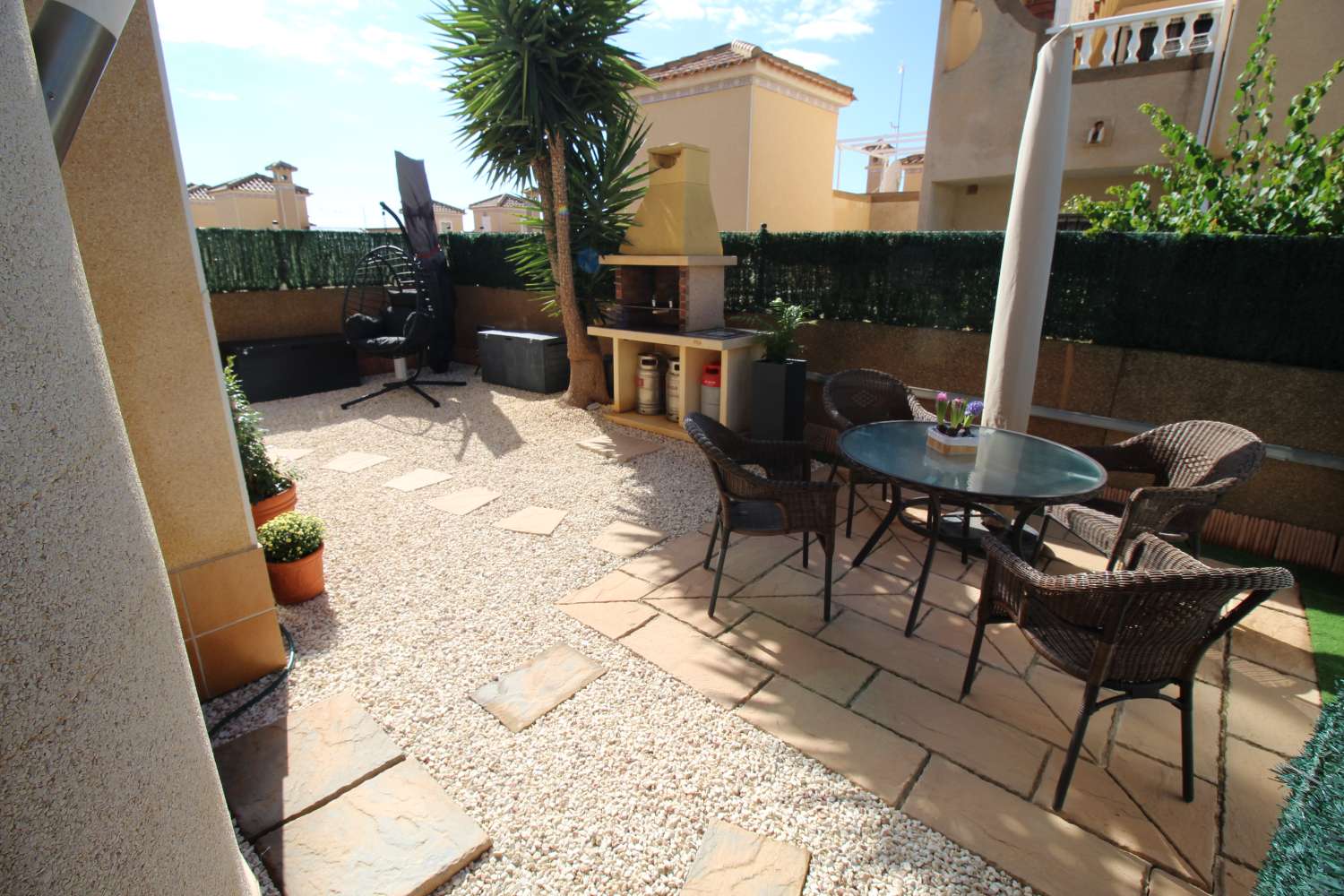 Quad-style bungalow with garden, terraces, swimming pool and sea views in Villamartín