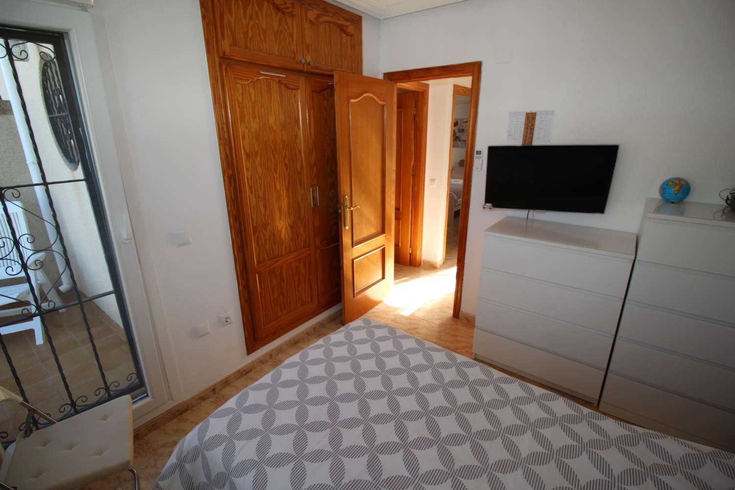 Quad-style bungalow with garden, terraces, swimming pool and sea views in Villamartín